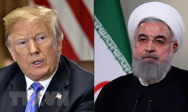 Tổng thống Mỹ Donald Trump (trái) và người đồng cấp Iran Hassan Rouhani (phải). (Nguồn: AFP/TTXVN)